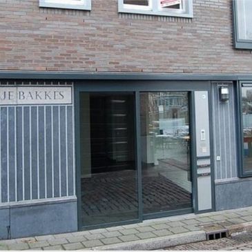 Voorbeeld natuursteen voorgevel